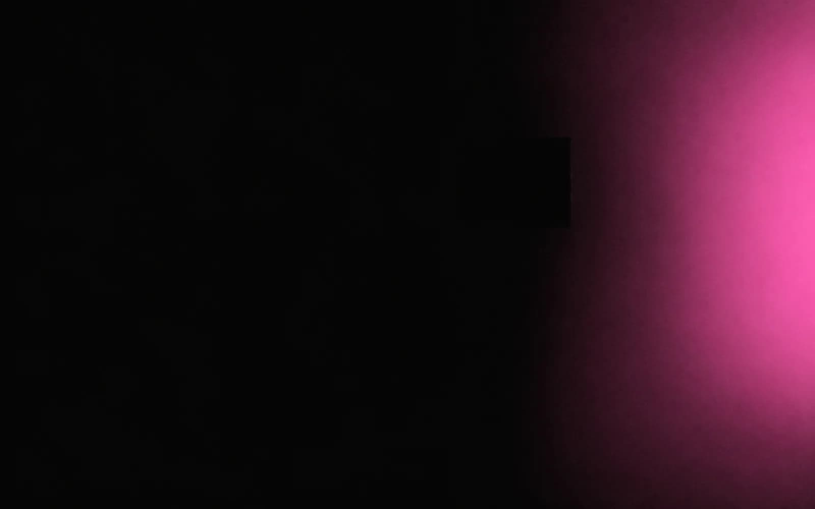 Pink light blooming along the edge of a dark frame, creative energy for the Design phase