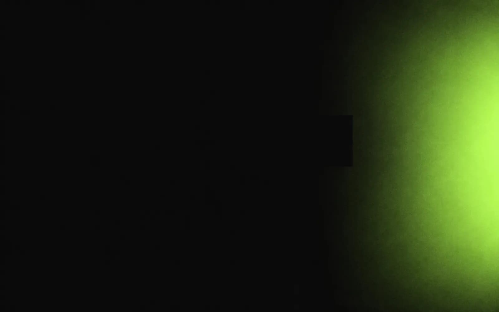 Green light glowing along the edge of a dark frame, results surfacing in the Measure phase