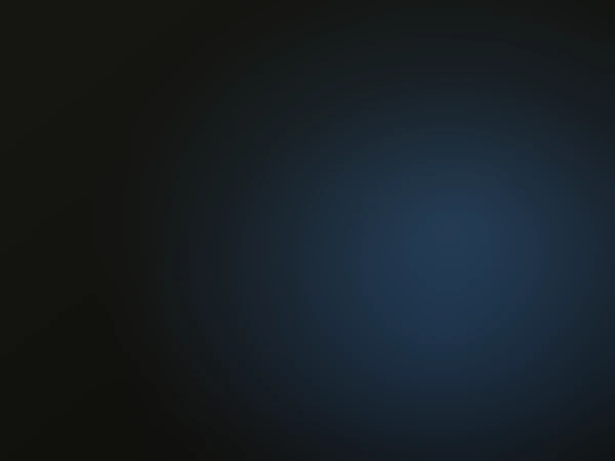 Steel-blue light spreading across a dark field, evoking the many teams and decisions behind a B2B customer journey